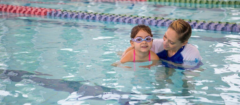 HOW SWIM LESSONS CAN BOOST A CHILD’S CONFIDENCE cover
